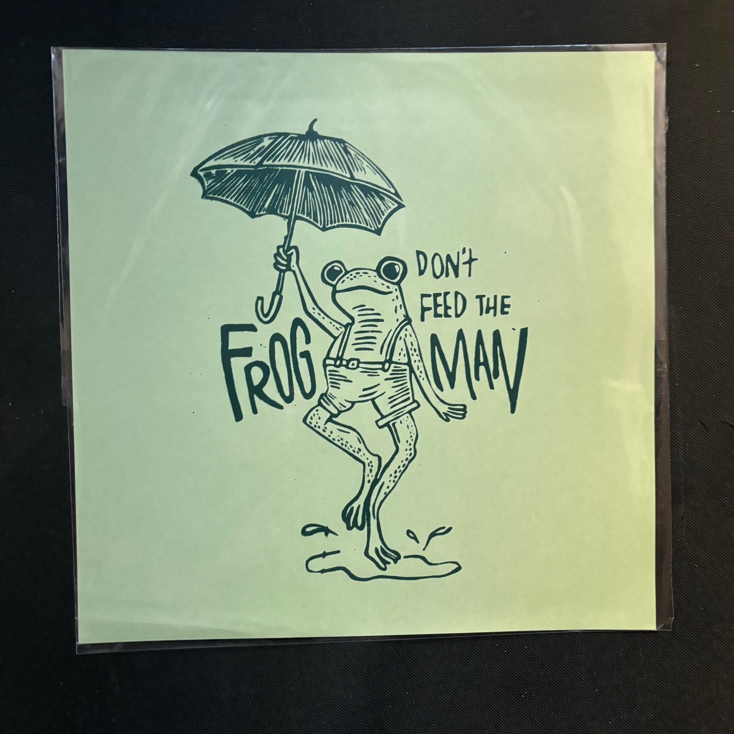 Don’t feed the Frogman 12x12 print - greens