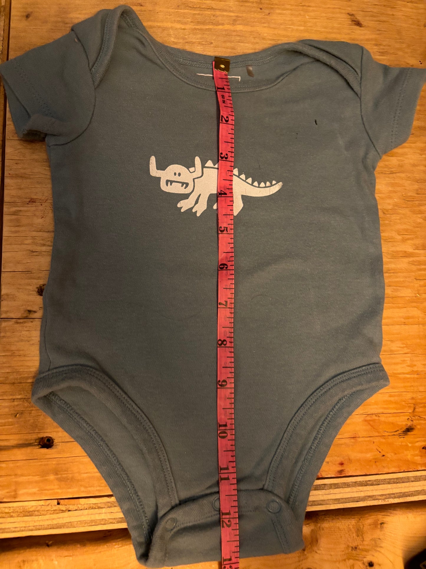 9M - hodag onesie